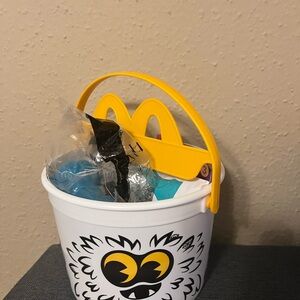 White Bucket with Yellow Handle and Graphic